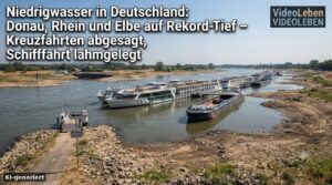 Niedrigwasser in Deutschland – Frachtschiffe auf der Donau bei Niedrigwasser (KI-generiertes Symbolbild)