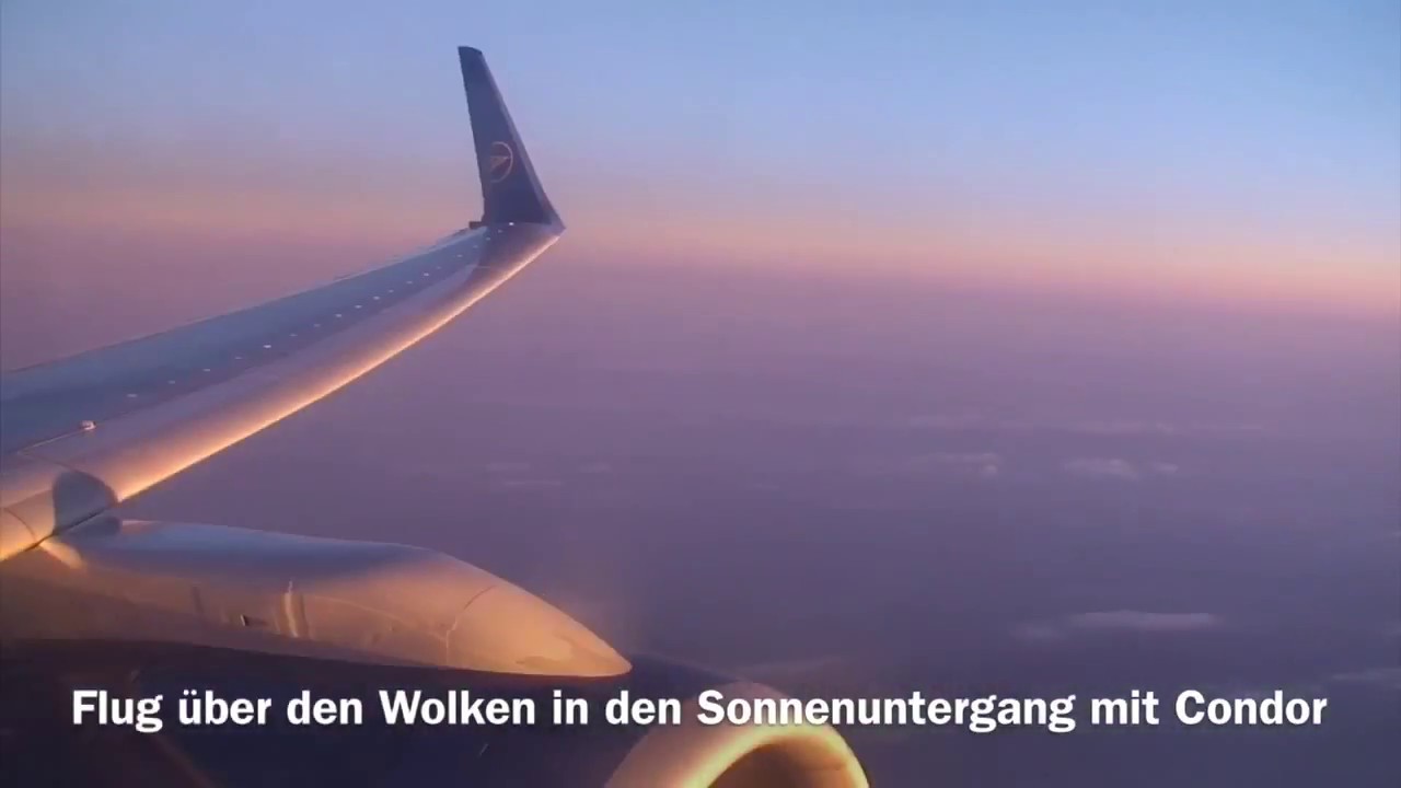 Flug über den Wolken in den Sonnenuntergang mit Condor